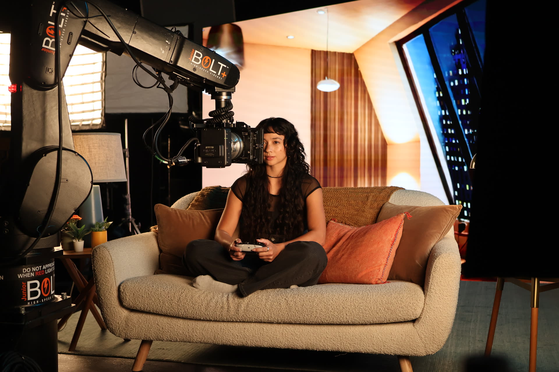 MRMC Bolt Jr. camera robot lined up on a practical couch set in front of the Form Studios LED volume at Cinedept in Van Nuys