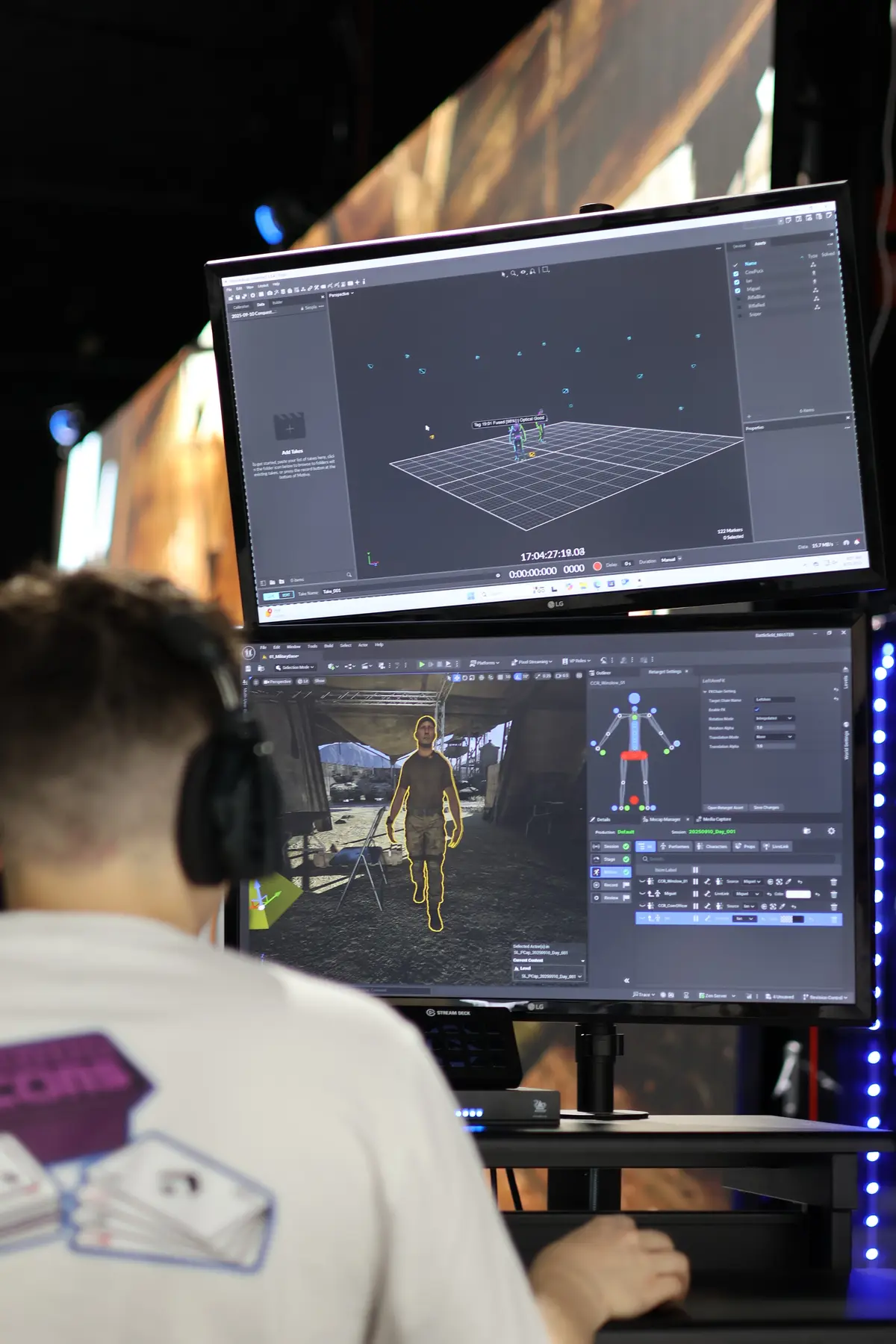 Operator monitoring real-time character retargeting on dual screens