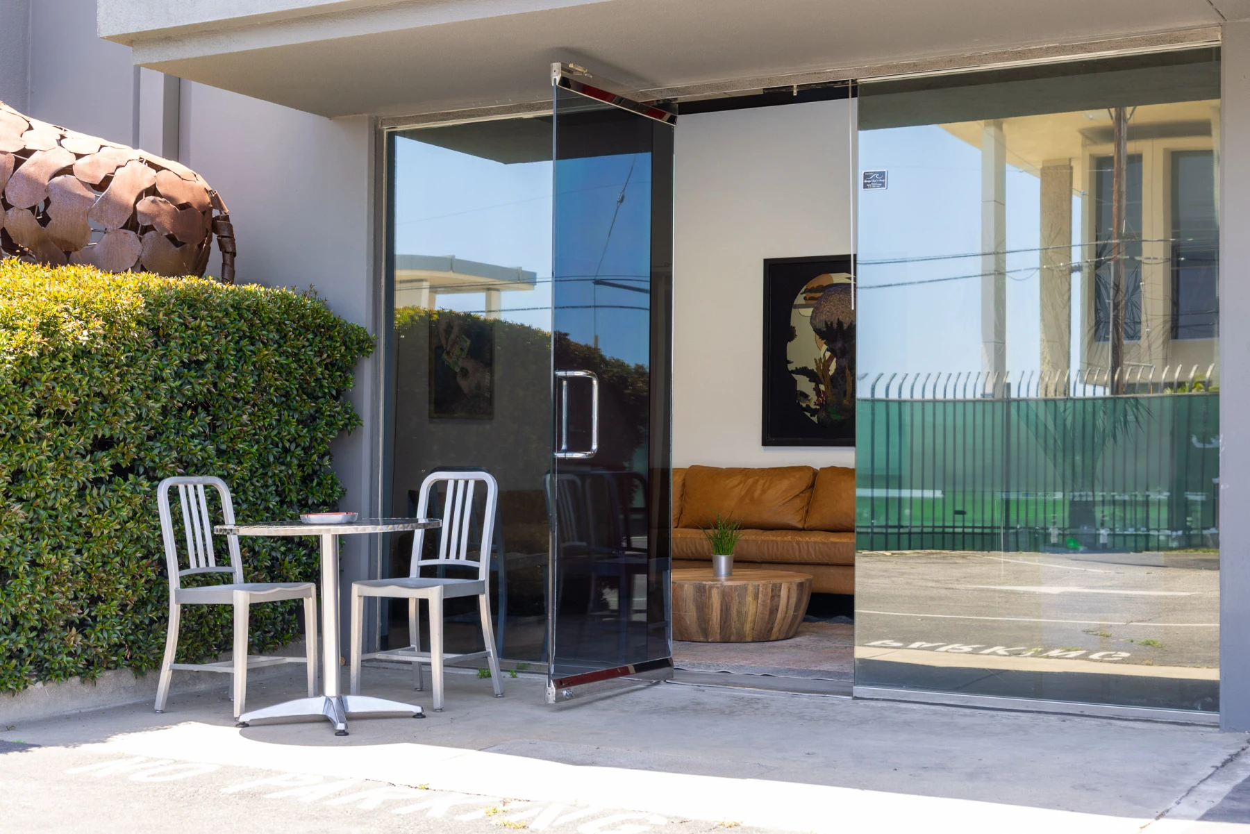 Green room exterior with patio seating