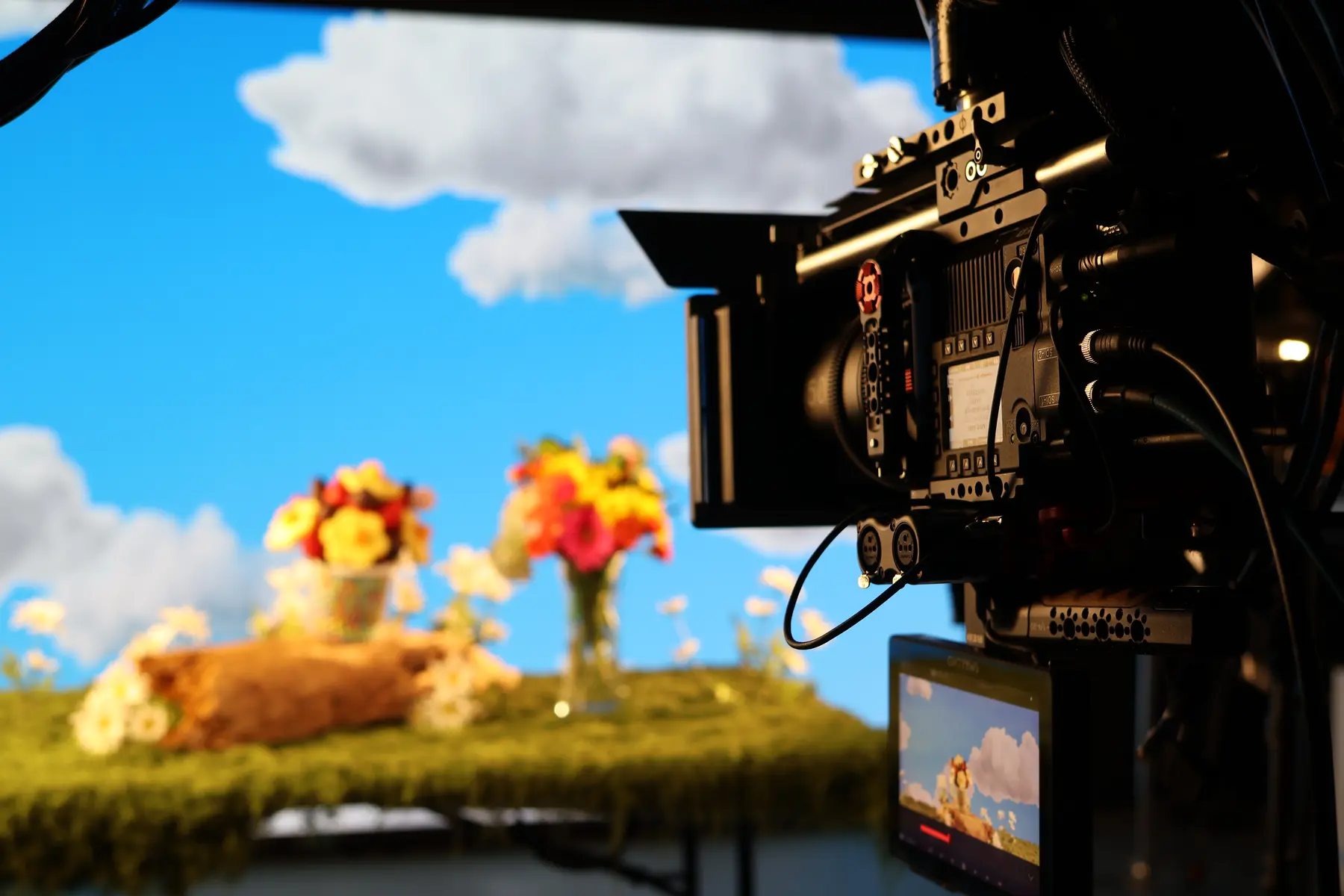 Camera with LED wall displaying sky environment